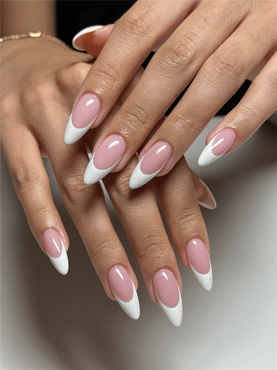 A classic French manicure previewed on a real hand with Naura